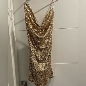 Tag on gold sequin strappy mini dress
